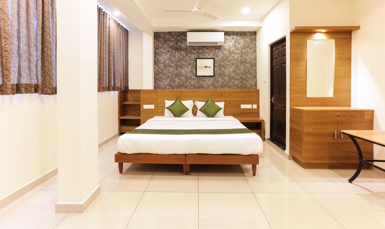 Treebo Trend Cmks Gulmohar Suites Kochi 外观 照片